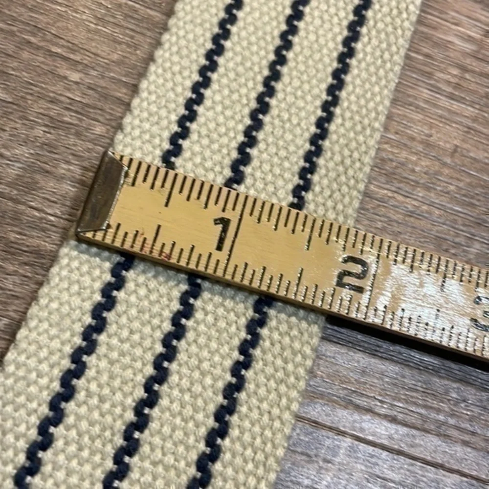 Natural fiber handcrafted loom woven tan and navy belt fits up to 38 inches